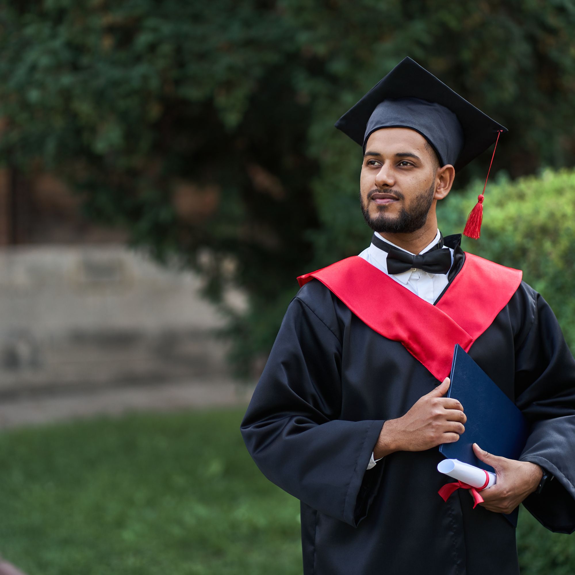 Free Photo | International graduates from celebrating diplomas in graduation  robes